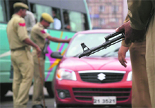 Policemen check vehicles at Indira Chowk in Jammu on Thursday.
