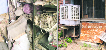 Age-old records lying in one corner; and a board and broken furniture of the District Ayurvedic office lying in the open