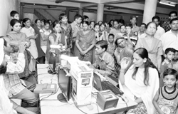 Residents rush for UID Aadhaar smart card at a gurdwara in Sector 30, Chandigarh, on Friday. 