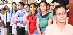 Students wait for their turn at the mega job fest at PHD House in Sector 31, Chandigarh, on Friday.