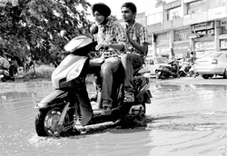 A water logged parking lot in Sector 20 market in Chandigarh on Saturday