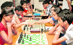 Players in action during a chess championship at St Xaviers School in Sector 44, Chandigarh