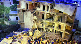 A view of the five-storey under-construction building which collapsed in Ghaziabad on Saturday.