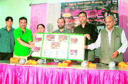 Dignitaries at the DVD release of a short film, "Main Mussoorie Hoon," in Mussoorie on Saturday