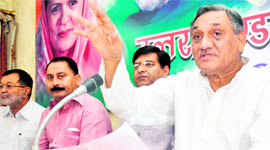 Vijay Bahuguna, Lok Sabha MP, addresses a press conference in Dehradun on Saturday.