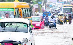 The main Haridwar road was flooded following heavy rain in Dehradun on Saturday.
