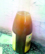 Muddy water collected in a bottle at Hargobind Nagar
