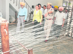 Dr Maria Haberfeld (in yellow shirt), professor Jhon Jay College, New York, and Jail Superintendent SP Khanna at the knitting unit in the Ludhiana Central Jail on Saturday