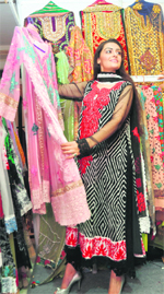 A visitor looks at the creations from Kashmir at the Bride and Groom exhibition in Ludhiana on Saturday