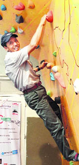 Apa Sherpa, world record holder for climbing Mt Everest 21 times, during the inauguration of an artificial climbing wall on the eve of the 10th Girimitra Sammelan in Mumbai 