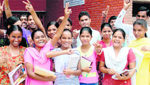 Students from slums in a jubilant mood after remedial coaching classes at Mauli colony in Chandigarh. 