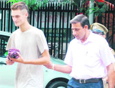 The accused being produced in district courts, Chandigarh. 