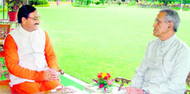 Chief Minister Ramesh Pokhriyal Nishank and state Governor BL Joshi in Dehradun on Sunday.