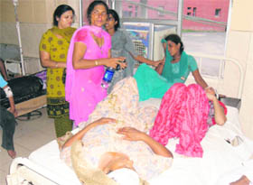 Three followers of Dera Sacha Sauda under treatment at the General Hospital, Fatehabad, after they were hurt in an accident on Sunday.