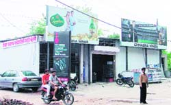 Under a cloud A liquor vend near the Chawni Mohalla locality, which has allegedly been opened under Mayor Hakam Singh Gyaspuras patronage, in Ludhiana