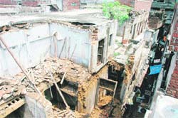 A view of the building that collapsed near the Girja Ghar Chowk area of Ludhiana