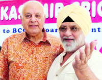 Jammu and Kashmir Cricket Association president Farooq Abdullah (L) with Bishen Singh Bedi in Srinagar on Sunday