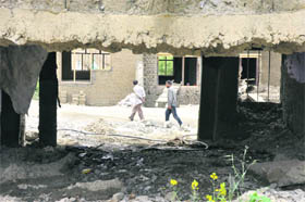 Damaged houses in Wakha village on the Srinagar-Leh highway.  