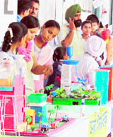 Students exhibit models during the INSPIRE Award Programme in Amritsar.
