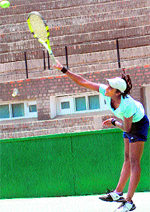 Likita Shetty serves during her match of the CLTA-AITA Chandigarh Open-50K Men and Women Tennis Tournament at the CLTA complex in Sector 10 of Chandigarh on Tuesday. Tribune photo: S Chandan