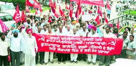 Activists of the CPI and CPI-M stage a protest rally against price rise and corruption in Ludhiana on Tuesday.