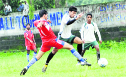 A match in progress in the Lala Nemi Dass Memorial District Football League played at the Pavilion grounds in Dehradun on Wednesday.