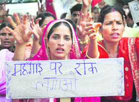 CPM activists hold a protest in Jammu on Wednesday. 