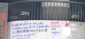 The parking contractor has pasted stickers at the place which mentions higher parking rates at MC Multi-Level Parking in Ludhiana. 