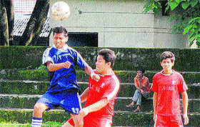 A match in progress in the Lala Nemi Dass Memorial District Football League played at the Pavilion grounds in Dehradun on Thursday.