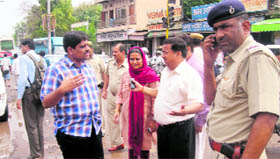 Deputy Commissioner Ajit Balaji Joshi gives instructions to officials in Rewari.