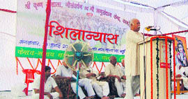 RSS leader Mohan Bhagwat addresses a gathering at Kabrel village near Hisar after laying the foundation stone of a gaushala.