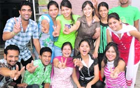 Toppers of MA (vocal arts)-I and II from Apeejay College of Fine Arts, Jalandhar, in joyous mood after their results were declared by the Guru Nanak Dev University