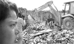 A demolition drive by GMADA under way at Lambian village in Mohali on Friday. 