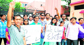 Students of SMJN College protest against the decision of the college management not to hold students council elections in Haridwar on Friday.