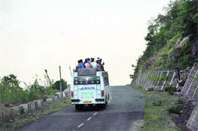 An overloaded minibus on way to Lakhanpur from Basohli in Kathua district