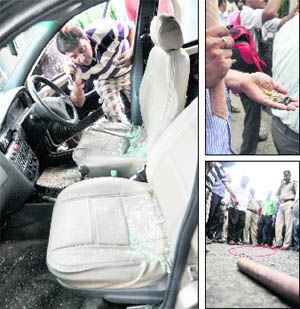 (Left) Rinka shows the broken windshield of his car at the Upkar Nagar area in Ludhiana; (Top) A cartridge (in circle) and a baseball bat seen at the site of the group clash;(Below) Cops show empty cartridges at the site of the group clash. 