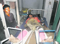 Hasibul being treated at a hospital after an under- construction lift fell at Focal Point in Ludhiana. 