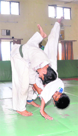 A bout between two young judo players in the Dehradun District Judo Championship held in Dehradun on Saturday.