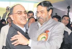 Union Commerce Minister Anand Sharma and his Bangladeshi counterpart Md Faruk Khan during the opening of the border haat at Kalaichar Garo Hills along the Indo-Bangla border, in Meghalaya on Saturday