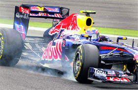 The front tyre of Red Bull Formula One driver Mark Webber smokes during the qualifying session of the German Grand Prix at the Nurburgring circuit on Saturday.