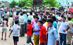 Residents of Colony Number 4 block a road at Industrial Area in Chandigarh on Sunday