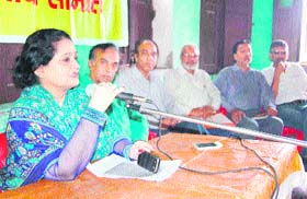 Manorama Dobriyal Sharma, a member of the Central Labour Advisory Board, addresses a meeting in Dehradun on Sunday
