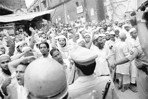 Darul Uloom students protest against the sacking of Maulana Vastanvi at Deoband on Sunday.