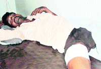 Manoj Mandal, who was injured in a firing incident, recuperates at a hospital in Jagraon.