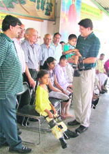 The Bharat Vikas Parishad distributes artificial limbs to 52 physically challenged persons in Ludhiana on Sunday. 