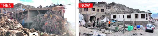 Even a year later, reconstruction is not yet over . The house (Above) in the bus stand area has partially been restored