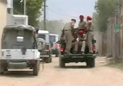Policemen on patrolling duty in the Gobindpura village of Mansa on Sunday to prevent any untoward incident. 