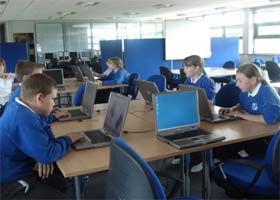 Children using the software listen to a text being read aloud by the computer, following the words as they are progressively highlighted on-screen in time with the voice