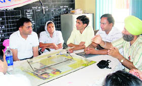 Civil Judge (Senior Division) Sudhir Parmar at a Lok Adalat at Panjuana village in Sirsa. 
