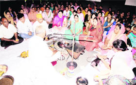 Faculty members and students of SDP College for Women take part in a havan ceremony in Ludhiana on Monday. 